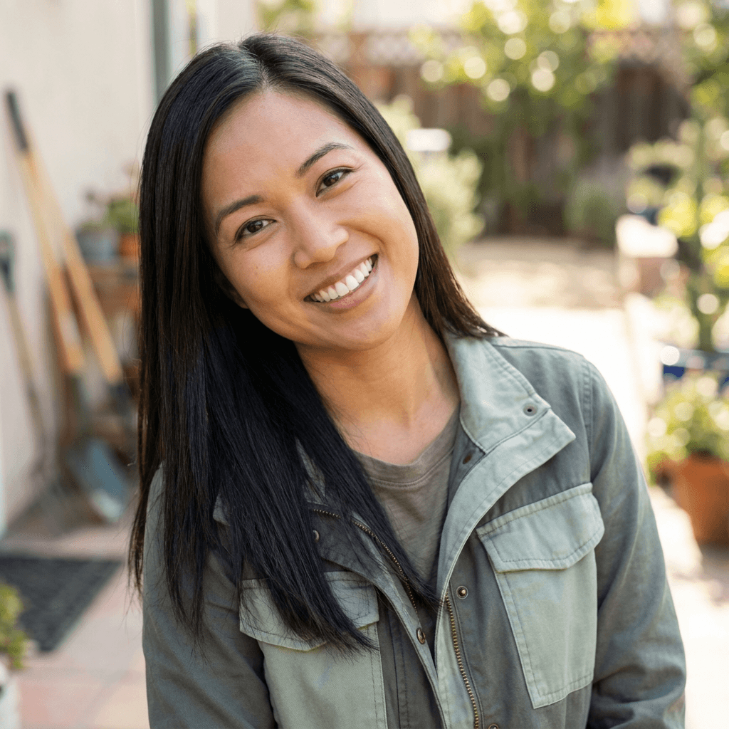 Female café owner in her late 40s, White, warm approachable demeanor suitable for small business owner